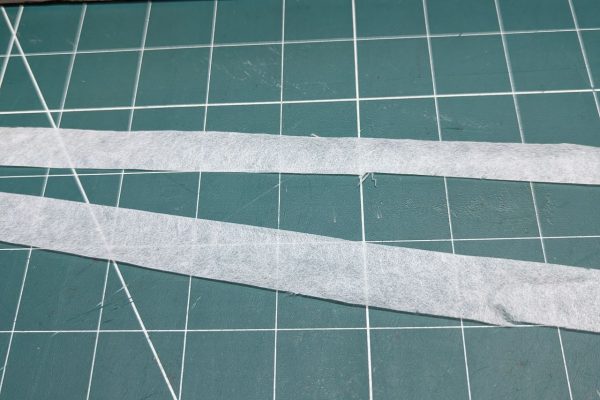 Cutting the strips of Kozo paper.
