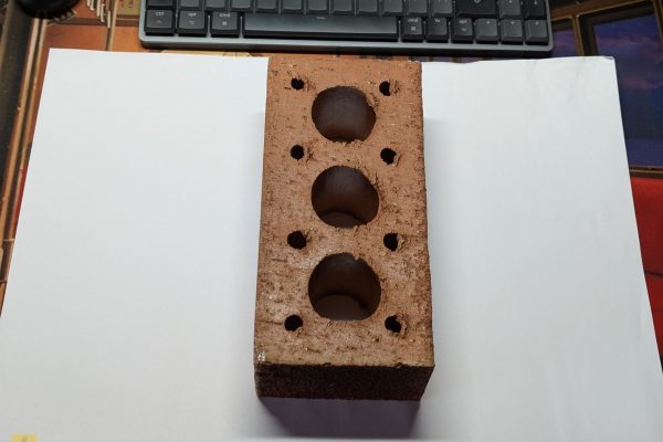 Wrapping the brick in A3 plain paper first.