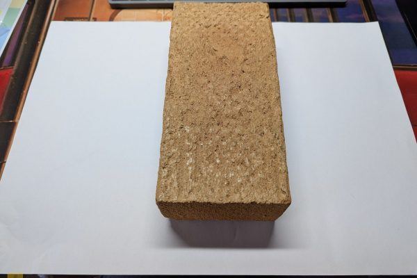 Wrapping the brick in A3 plain paper first.
