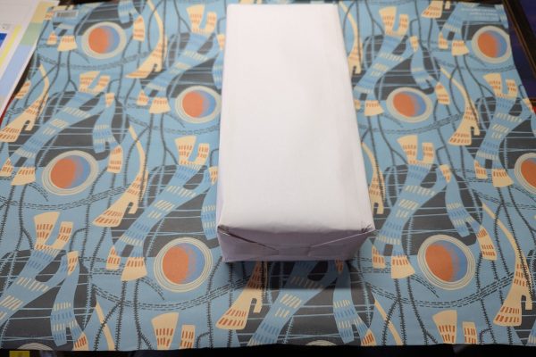 Wrapping in the patterned paper.