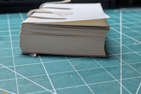 Rounded spine, with the steps in the fore-edge.