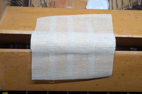 Cutting and gluing mull to the spine.