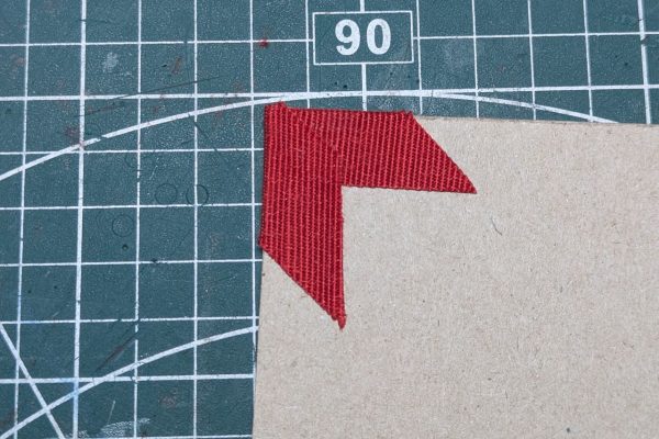 Gluing the corners to the covers.