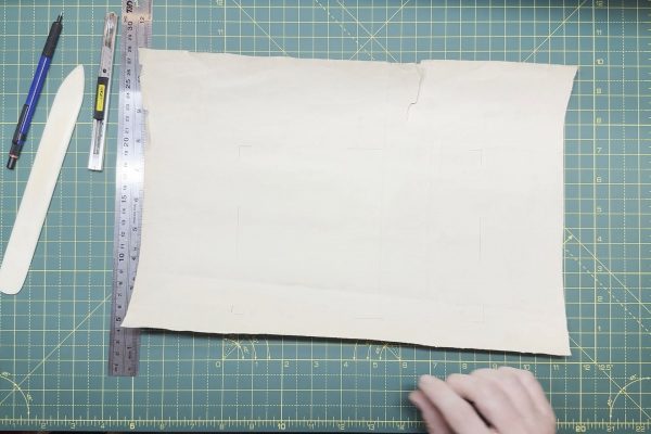 The pencil markings where the card will be glued.