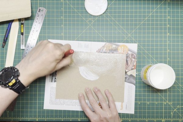 Applying glue to the card.