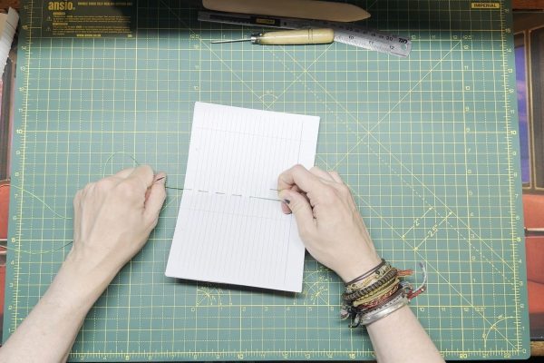 Make sure to keep the thread taut as you are sewing.