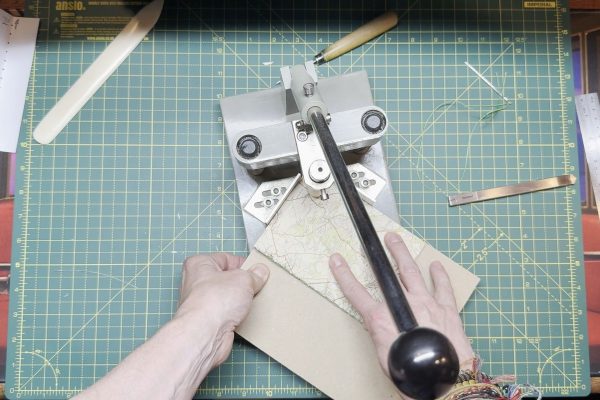 Using my heavy-duty corner punch.